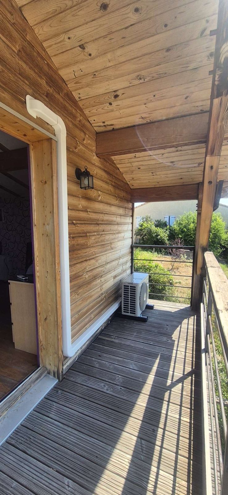 Climatisation réversible sur terrasse bois
